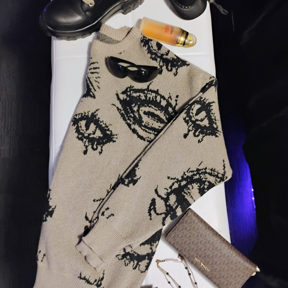 Beige Sweater with Black Abstract Design